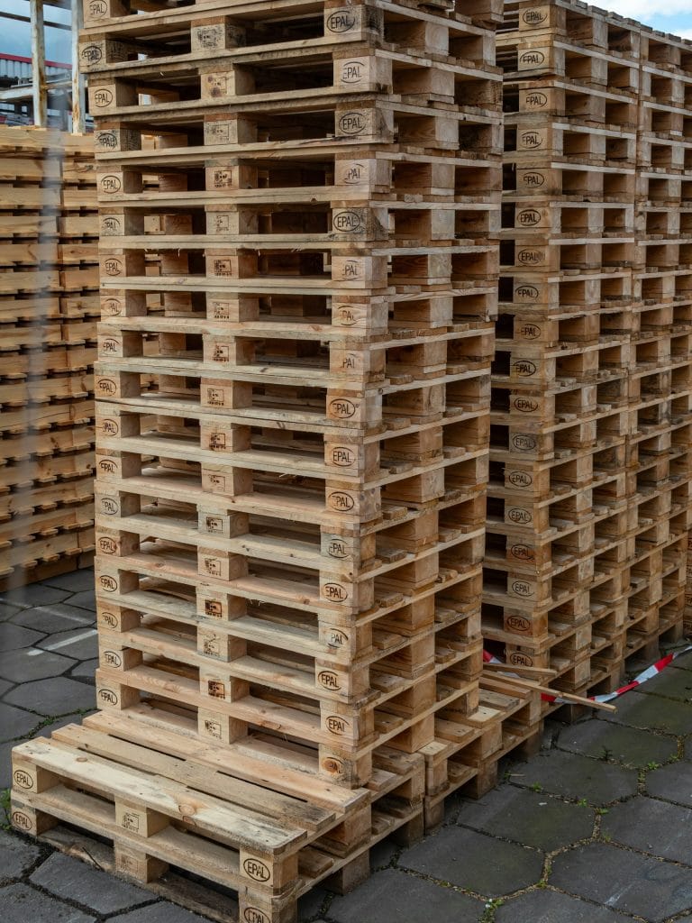Close-up of wooden pallet showing boards and nails used in industrial shipping and handling